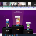 Screen monitora z widokiem na twarze osób oraz kolorową grafikę gry komputerowej.png