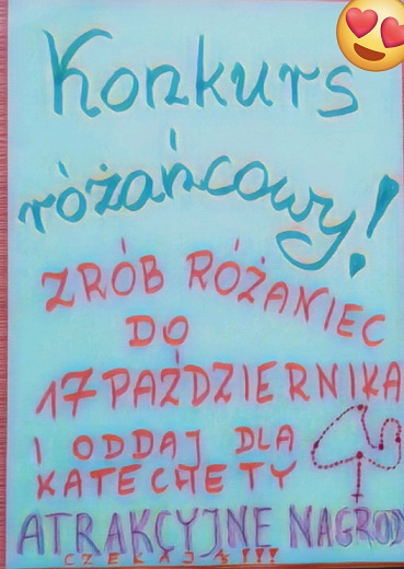 Niebieski plakat z różowym napisem o konkursie.jpg