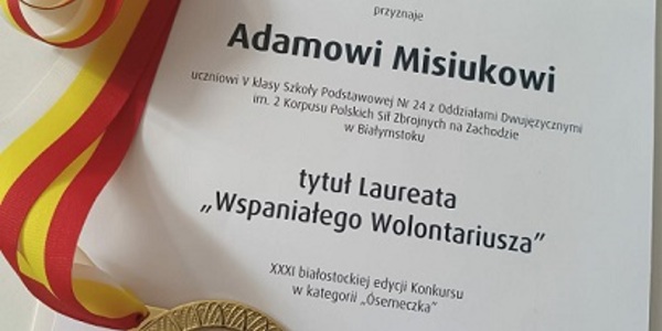 Dyplom z medalem.jpg